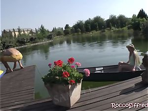 Misha Crossrides Rocco's spunk-pump by the lake