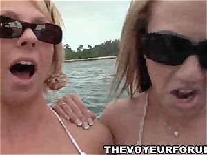 first-timer lezzie bathing suit honeys have a playful intercourse on a boat